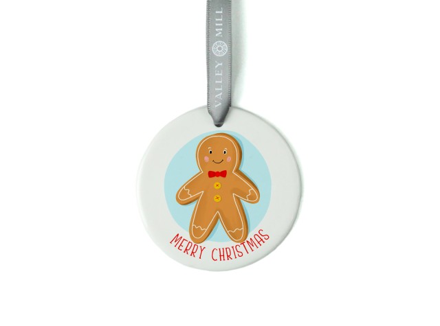 White ceramic christmas tree decoration with the image of a cute gingerbread man